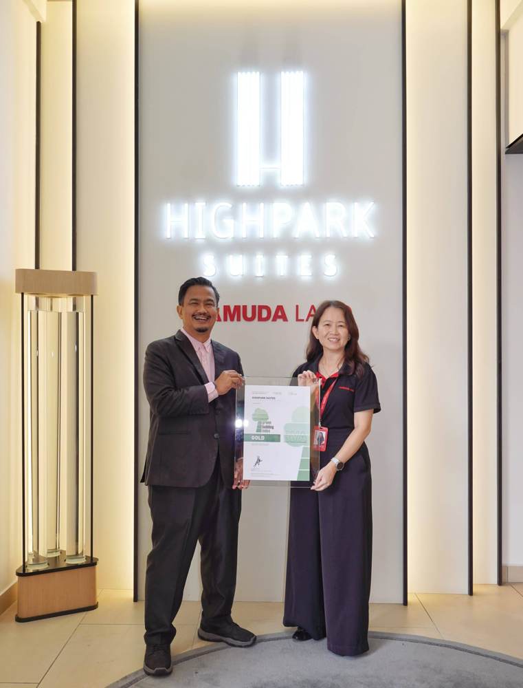 Receiving the HighPark Suites renewal certificate